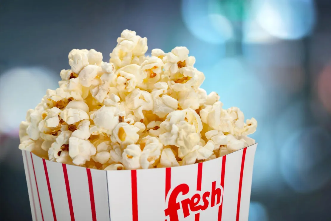 Bowl of air-popped popcorn, symbolizing a healthy, high-volume snack.