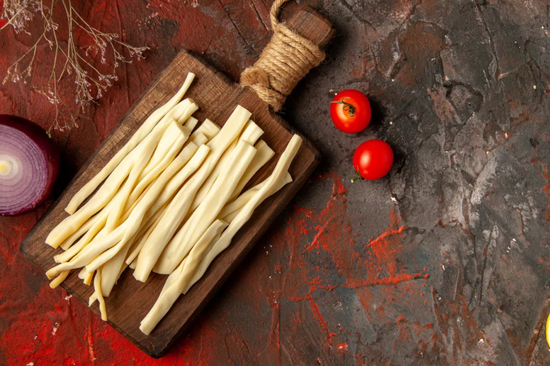 Is String Cheese Healthy for Weight Loss? A close-up of string cheese with nutritional facts